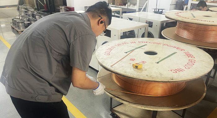 Geliss freeze dryer R&D lab history in 2015 - engineers testing vacuum pump performance and running freeze cycles on the first lyophilizer prototype